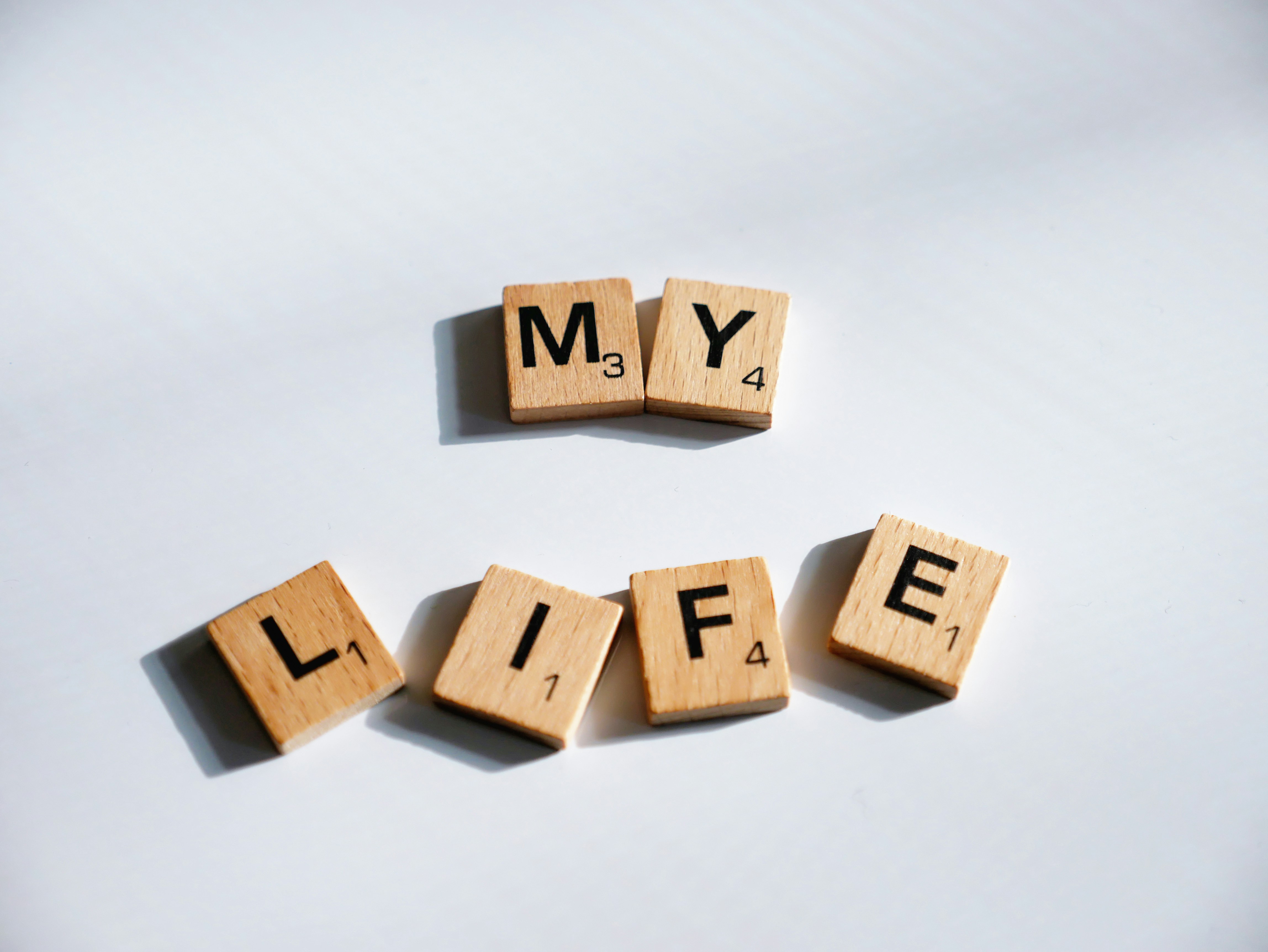 Scrabble-Steine mit der Aufschrift „My Life“